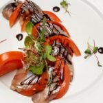 Silkė su pomidorais – elegantiška tradicija šventiniam stalui